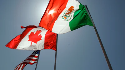 The flags of the United States, Canada, and Mexico fly in the breeze in New Orleans, where leaders of the North American Free Trade Agreement met on April 21, 2008.