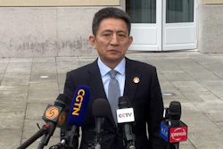Chinese lead trade negotiator Li Chenggang gives a press conference at the Organization for Economic Cooperation and Development headquarters, March 16, 2026, Paris.