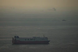 Cargo ships sail in the Arabian Gulf towards Strait of Hormuz in United Arab Emirates, March 19, 2026.
