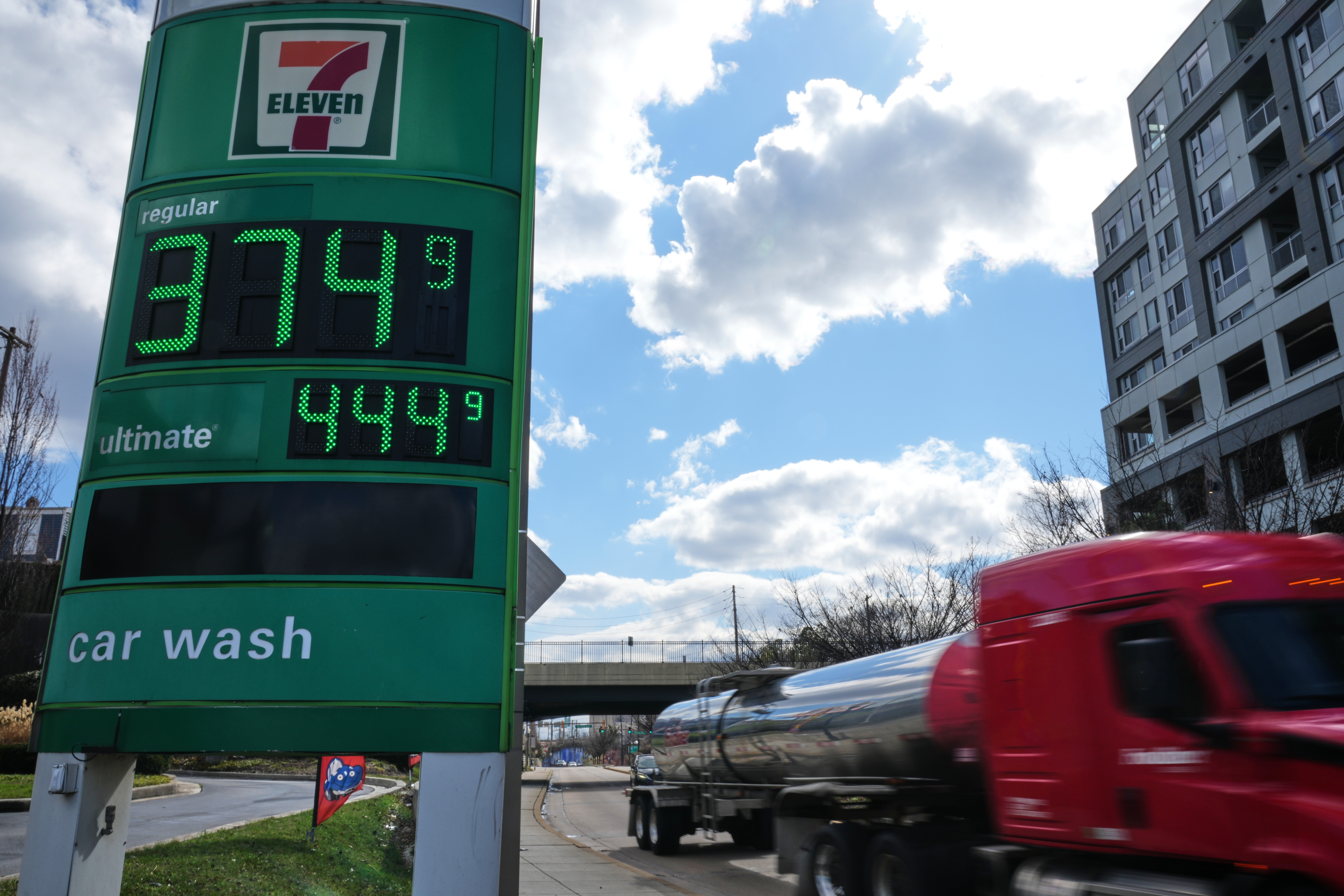 Fuel prices at a Baltimore gas station as a fuel truck drives by, March 17, 2026.