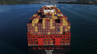 A cargo ship moves through the Panama Canal, March 25, 2026.