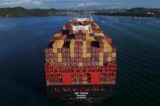A cargo ship moves through the Panama Canal, March 25, 2026.