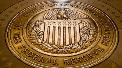 The seal of the Board of Governors of the United States Federal Reserve System is displayed in the ground at the Marriner S. Eccles Federal Reserve Board Building in Washington, Feb. 5, 2018.