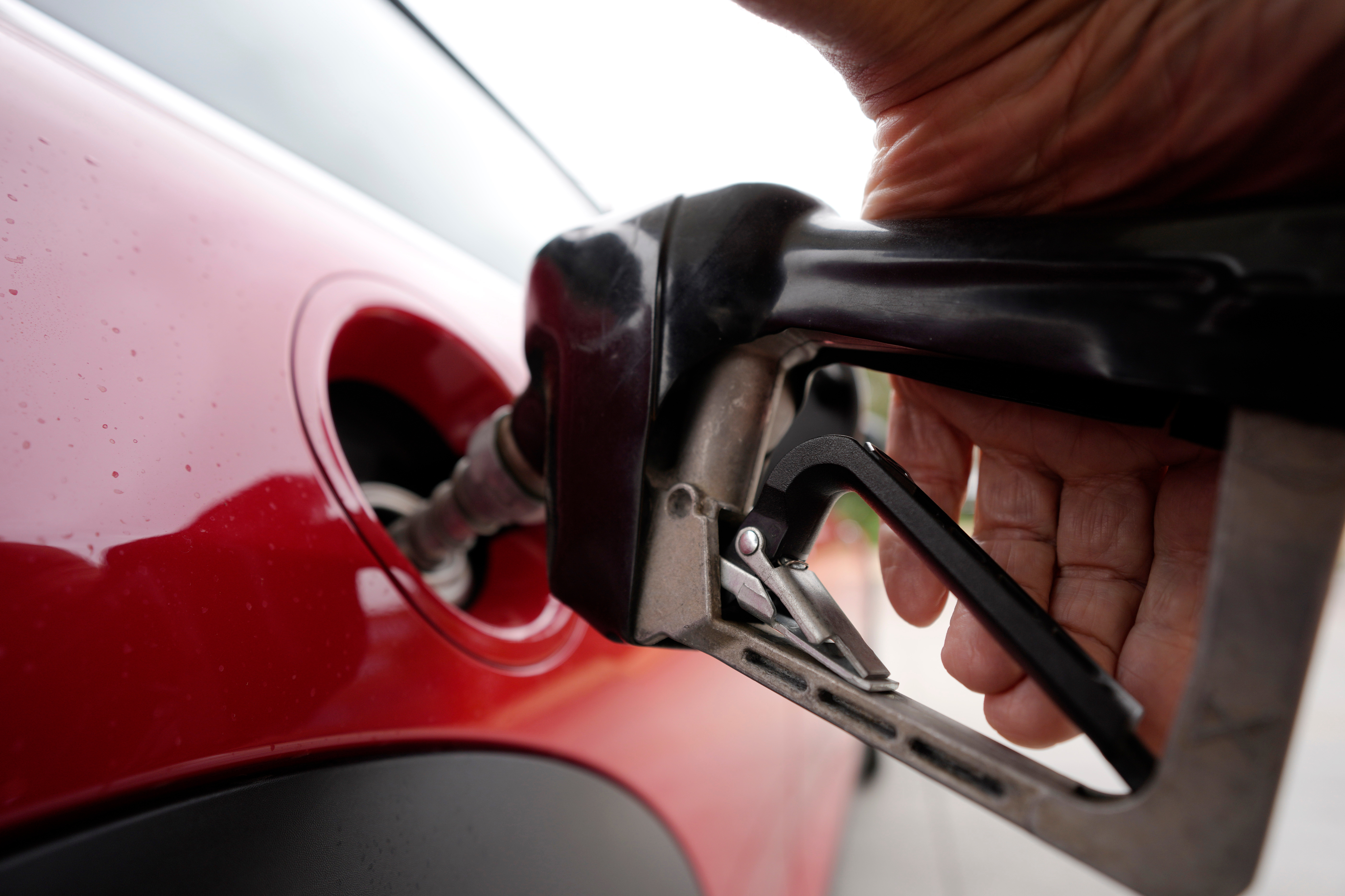 A motorist pumps fuel at a Shell station Wednesday, July 5, 2023, in Englewood, Colo.