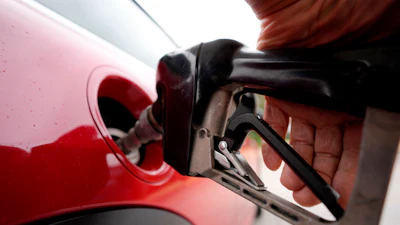A motorist pumps fuel at a Shell station Wednesday, July 5, 2023, in Englewood, Colo.