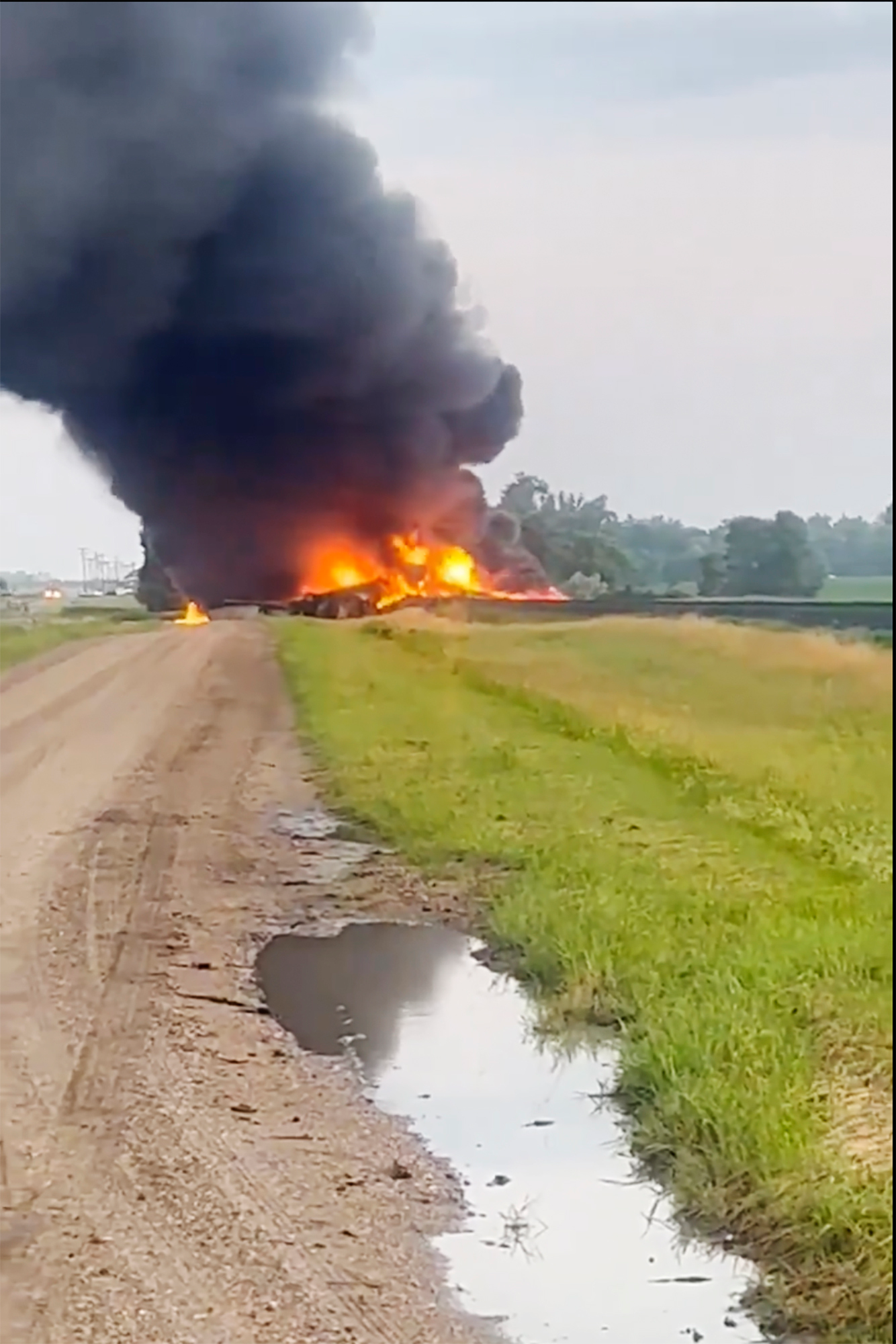 Smoke fills the sky after a train derailment near Carrington, N.D., July 5, 2024