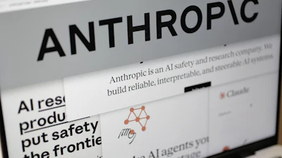 Pages from the Anthropic website and the company's logo are displayed on a computer screen in New York, Feb. 26, 2026.