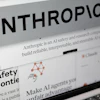 Pages from the Anthropic website and the company's logo are displayed on a computer screen in New York, Feb. 26, 2026.