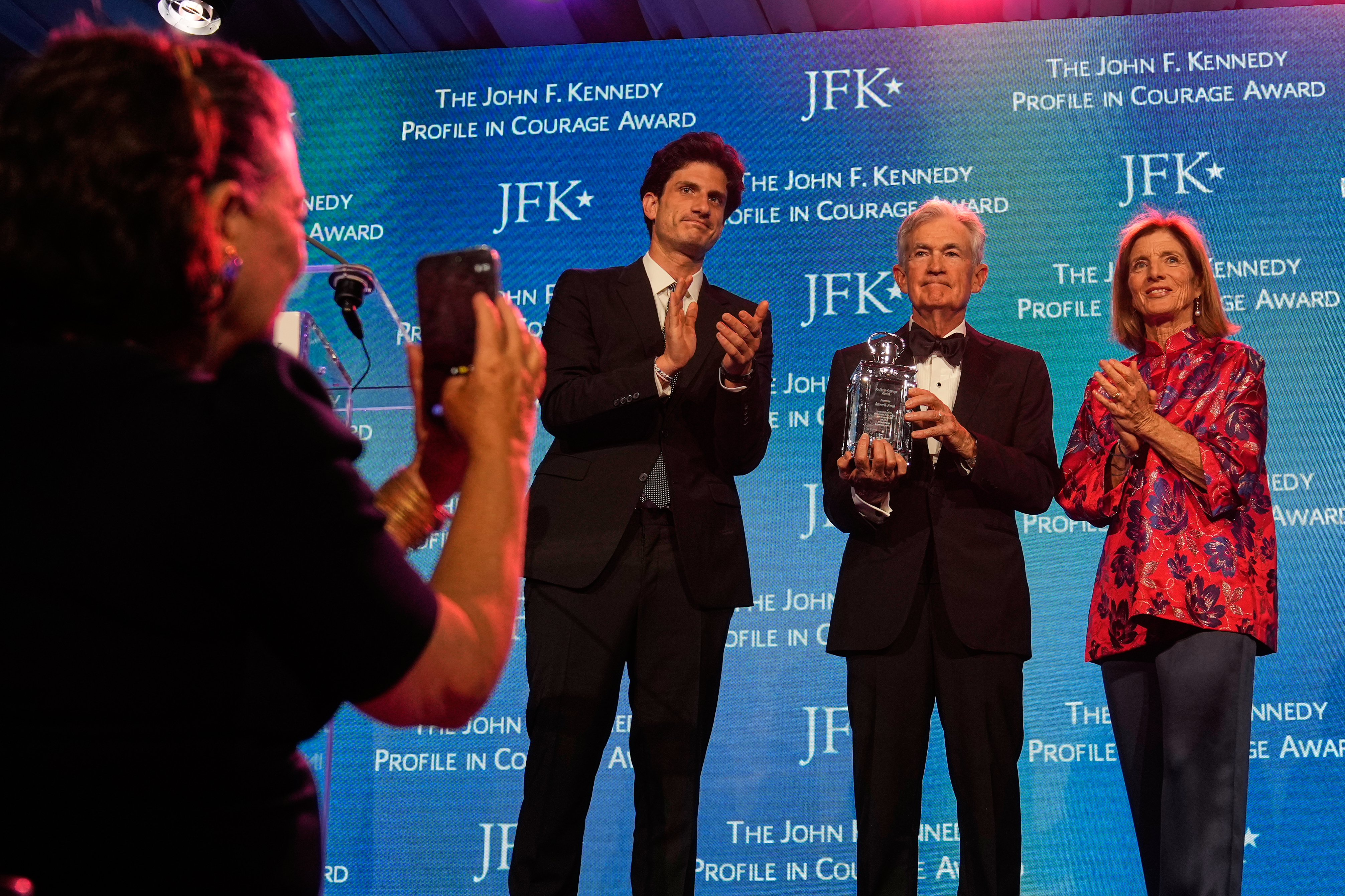 Federal Reserve Board Governor Jerome Powell, center, with former ambassador Caroline Kennedy, right, and her son Jack Schlossberg at the John F. Kennedy Presidential Library, Boston, May 31, 2026.