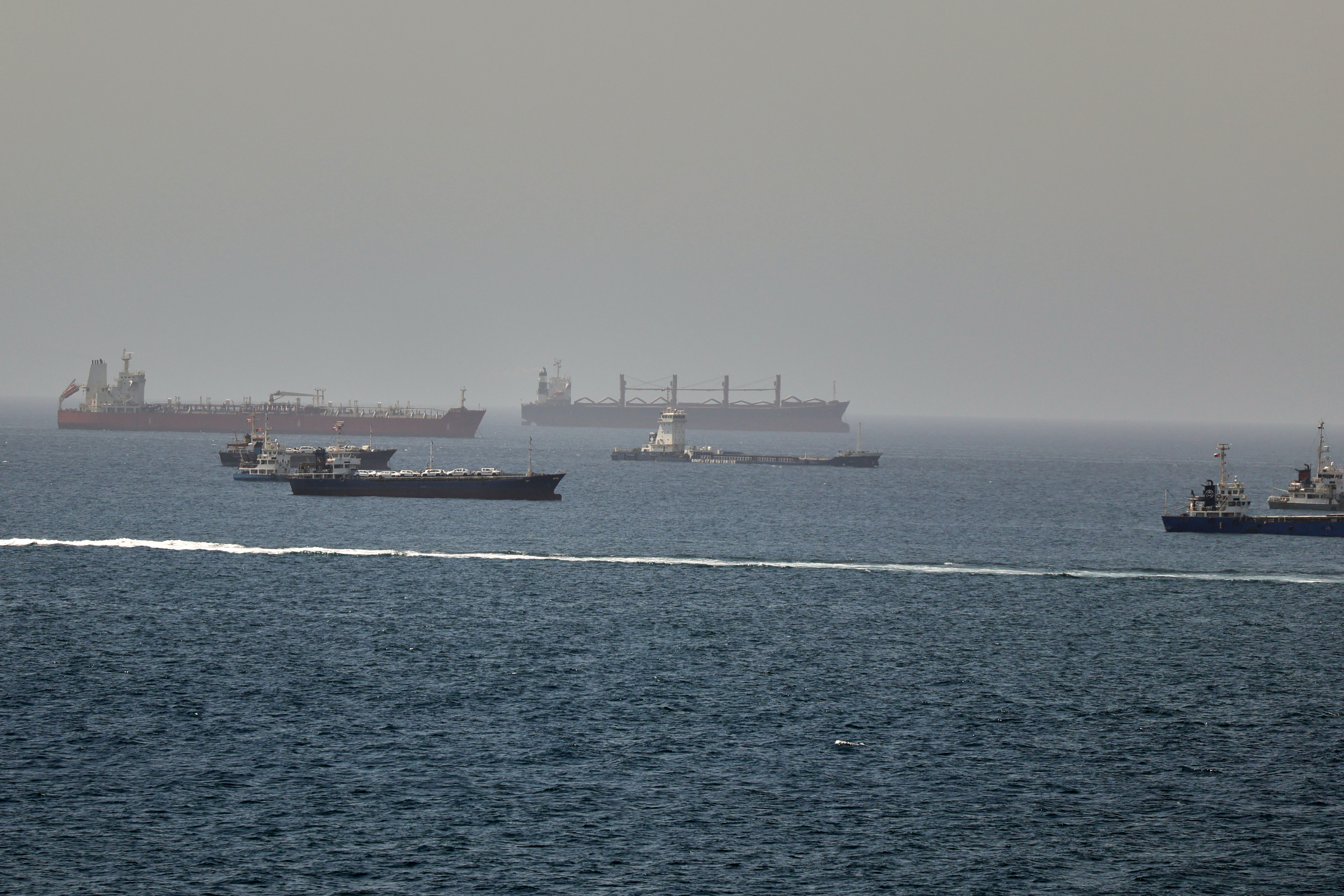 Tankers and cargo vessels in the Gulf of Oman, June 16, 2026.
