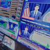 Federal Reserve Chair Kevin Warsh's press conference appears on screens on the floor of the New York Stock Exchange, June 17, 2026.