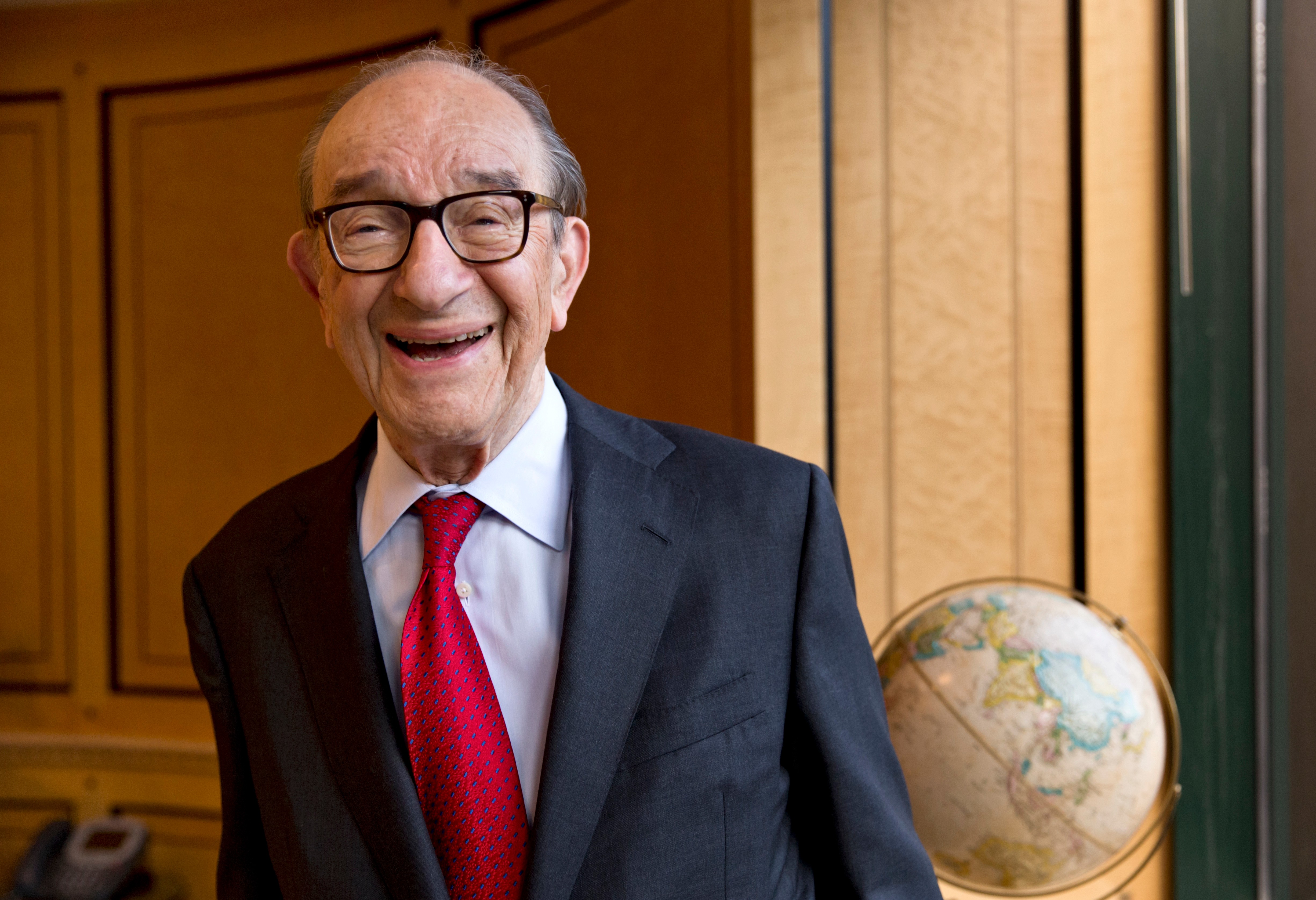 Economist Alan Greenspan, chairman of the Federal Reserve from 1987 to 2006, in his office in Washington, Oct. 18, 2013.