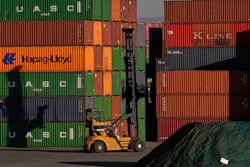 Shipping containers stacked at a depot in Johannesburg, South Africa, Aug. 1, 2025.