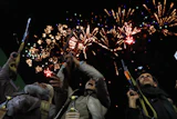 Fireworks burst as Houthi supporters rally against the Saudi-led coalition in Sanaa, Yemen, July 20, 2026.