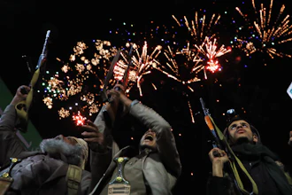 Fireworks burst as Houthi supporters rally against the Saudi-led coalition in Sanaa, Yemen, July 20, 2026.