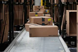 Boxes on a conveyor belt at an Amazon warehouse in Tepotzotlan, Mexico, May 22, 2025.