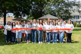 A ribbon-cutting ceremony during Global Industrial's “Corporate Day of Service' at Harmony Heights Day School, East Norwich, New York, July 17, 2026.