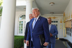 President Donald Trump arrives with Los Angeles Dodgers manager Dave Roberts and owner Mark Walter for an event to honor the 2025 World Series champions Los Angeles Dodgers in the Rose Garden of the White House, Thursday, July 23, 2026, in Washington.