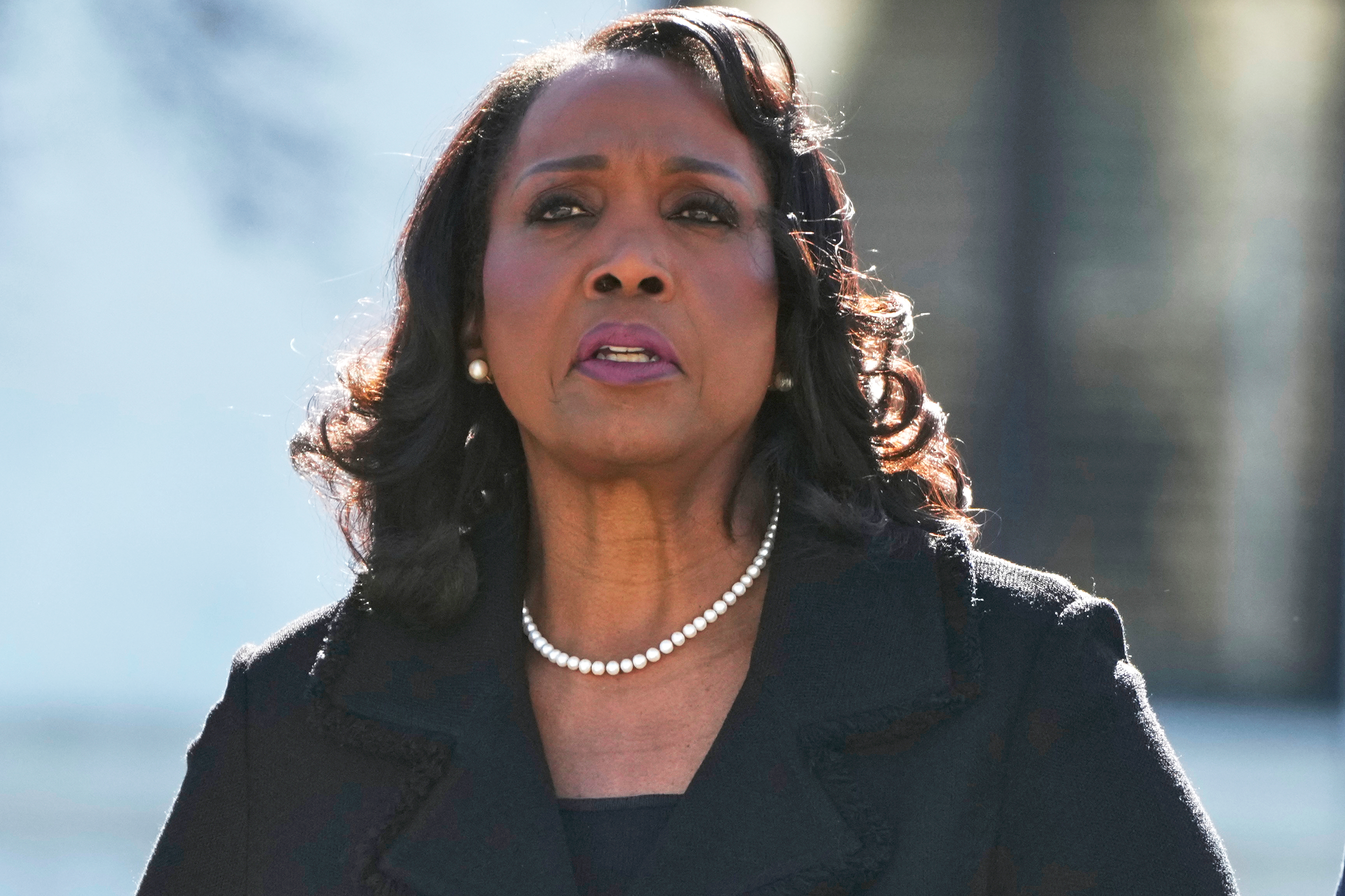 Federal Reserve Board of Governors member Lisa Cook leaves the Supreme Court in Washington, Jan. 21, 2026.