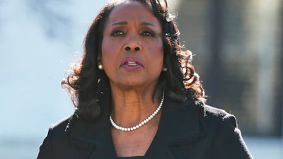Federal Reserve Board of Governors member Lisa Cook leaves the Supreme Court in Washington, Jan. 21, 2026.