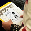 A job seeker waits to talk to a recruiter at a job fair in Sunrise, Fla., Aug. 28, 2025.