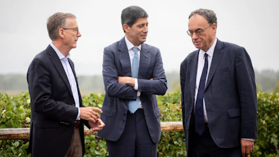Fed Chair Kevin Warsh, center, talks to Bank of England Governor Andrew Bailey, right, and Bank of Canada Governor Tiff Macklem at the annual Jackson Hole Economic Policy Symposium, Aug. 28, 2026, Moran, Wyo.