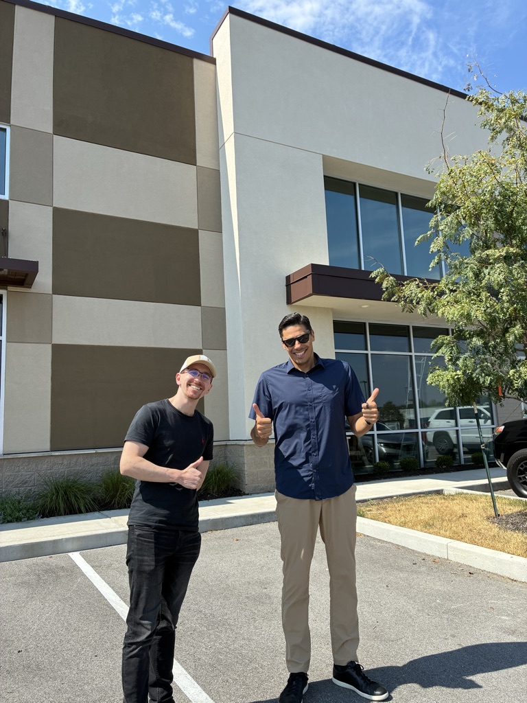 Daniel Ackroyd, vice president of U.S. operations for Accu, left, and Giovanni Cespedes, managing director of Accu, outside Accu’s new U.S. headquarters.