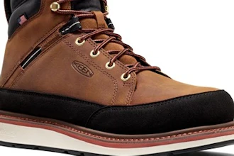 Brown leather hiking boot with black accents and cream-colored sole