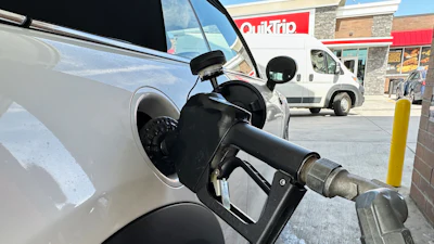A motorist fills up at a QuikTrip gas station, Sept. 15, 2026, Greenwood Village, Colo.