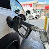 A motorist fills up at a QuikTrip gas station, Sept. 15, 2026, Greenwood Village, Colo.