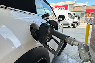 A motorist fills up at a QuikTrip gas station, Sept. 15, 2026, Greenwood Village, Colo.