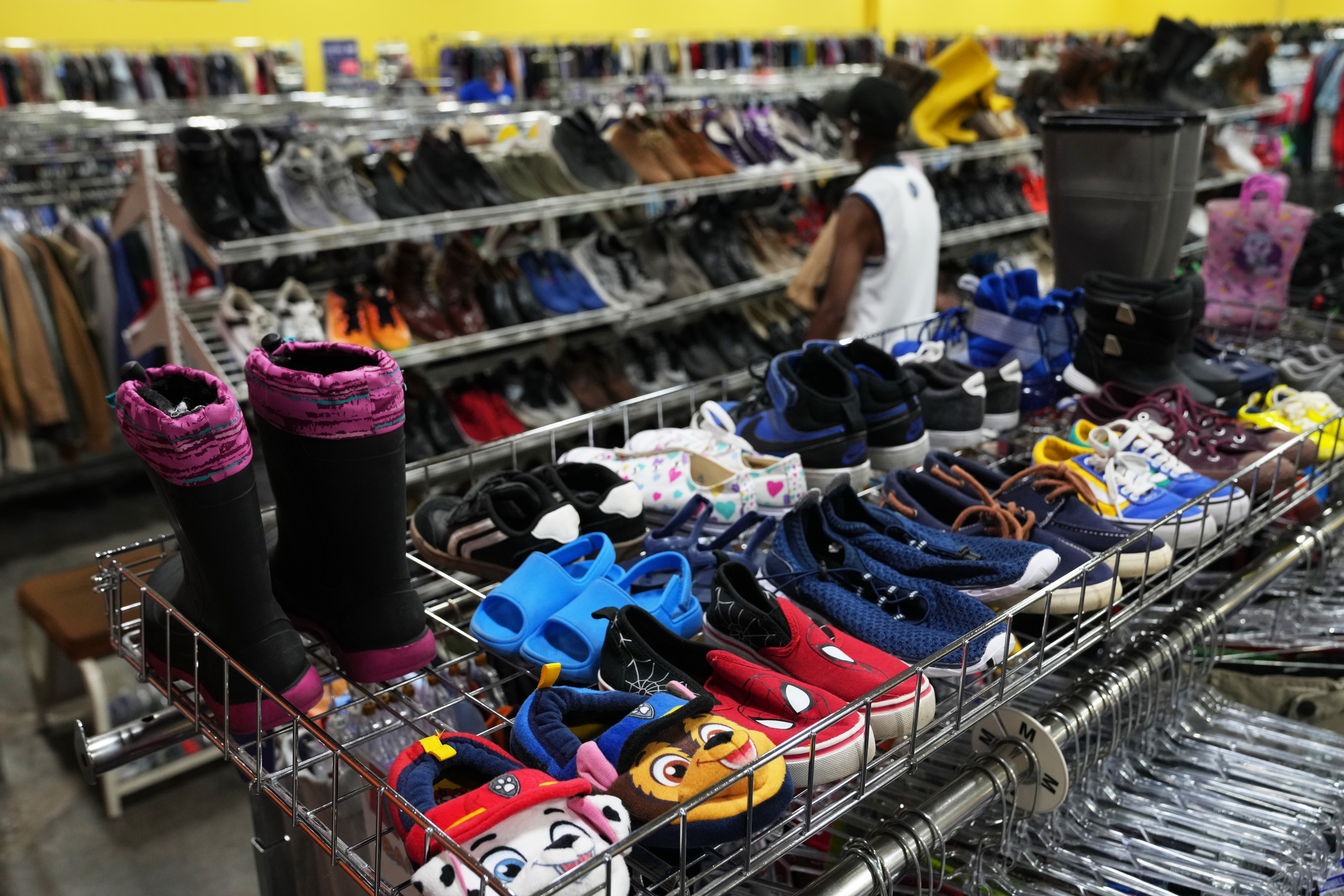 The children's shoe section is seen at a Goodwill store in Roseville, Minn., Aug. 12, 2026.