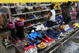 The children's shoe section is seen at a Goodwill store in Roseville, Minn., Aug. 12, 2026.