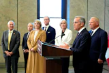 Canada Prime Minister Mark Carney and Ontario Premier Doug Ford, right, are joined by federal and provincial ministers at a joint news conference on Parliament Hill in Ottawa, Oct. 21, 2026.