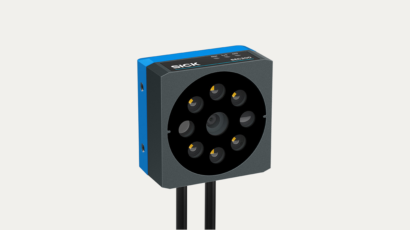 SICK 3D camera sensor with blue and gray housing and circular lens array with gold contact points